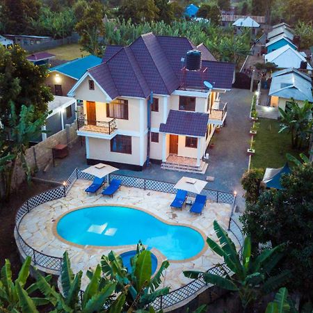 Rayan Apartments & Safaris Аруша Екстер'єр фото