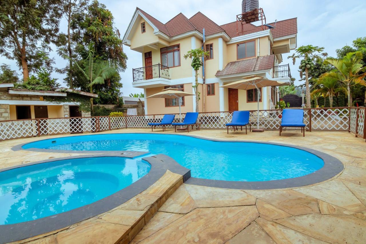 Rayan Apartments & Safaris Аруша Екстер'єр фото
